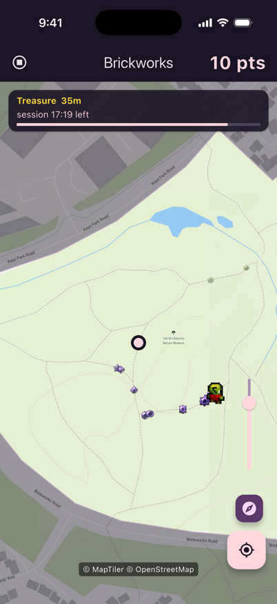 The map of a park with a goblin crossing it and a trail of purple gems on the path behind it.